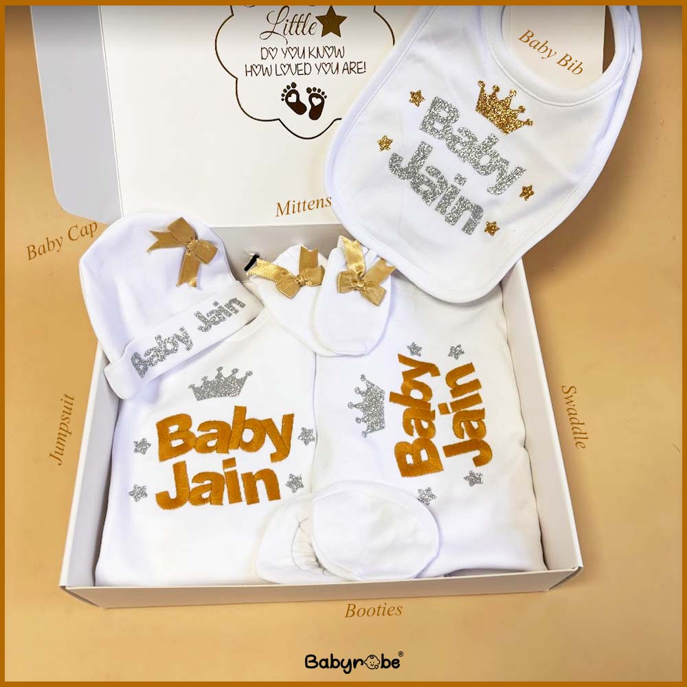 Baby romper with custom embroidery and playful pattern"