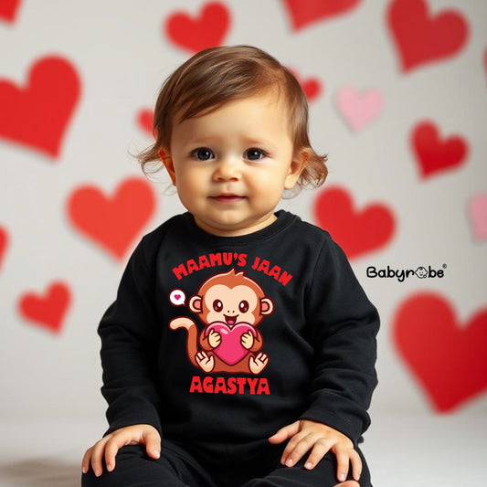 "Personalized baby jumpsuit with custom name and playful design."
