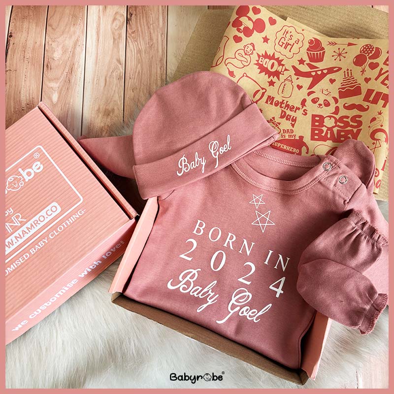 Personalized baby jumpsuit with custom name and playful design"