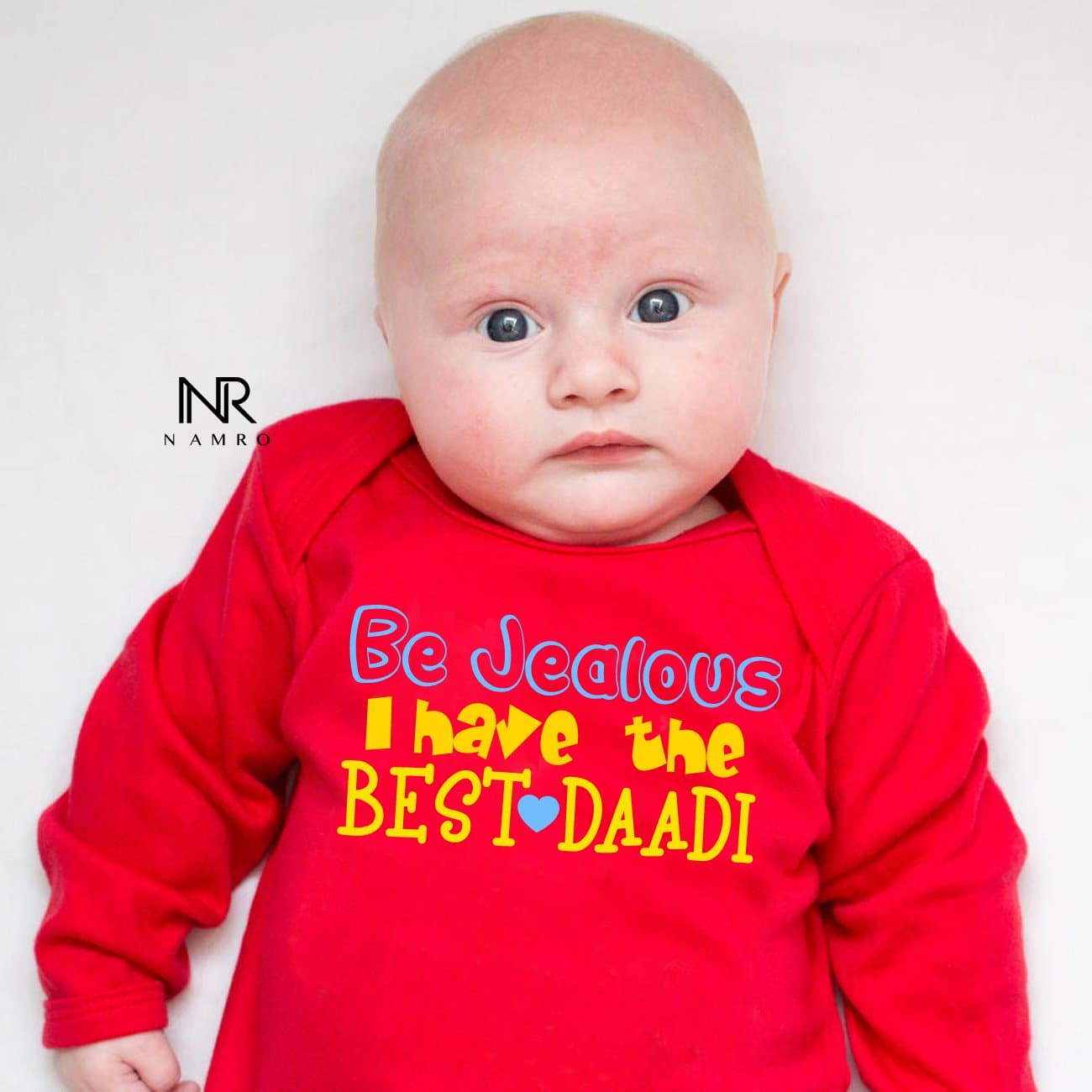 "Adorable custom jumpsuit for babies with unique artwork and cozy fit."