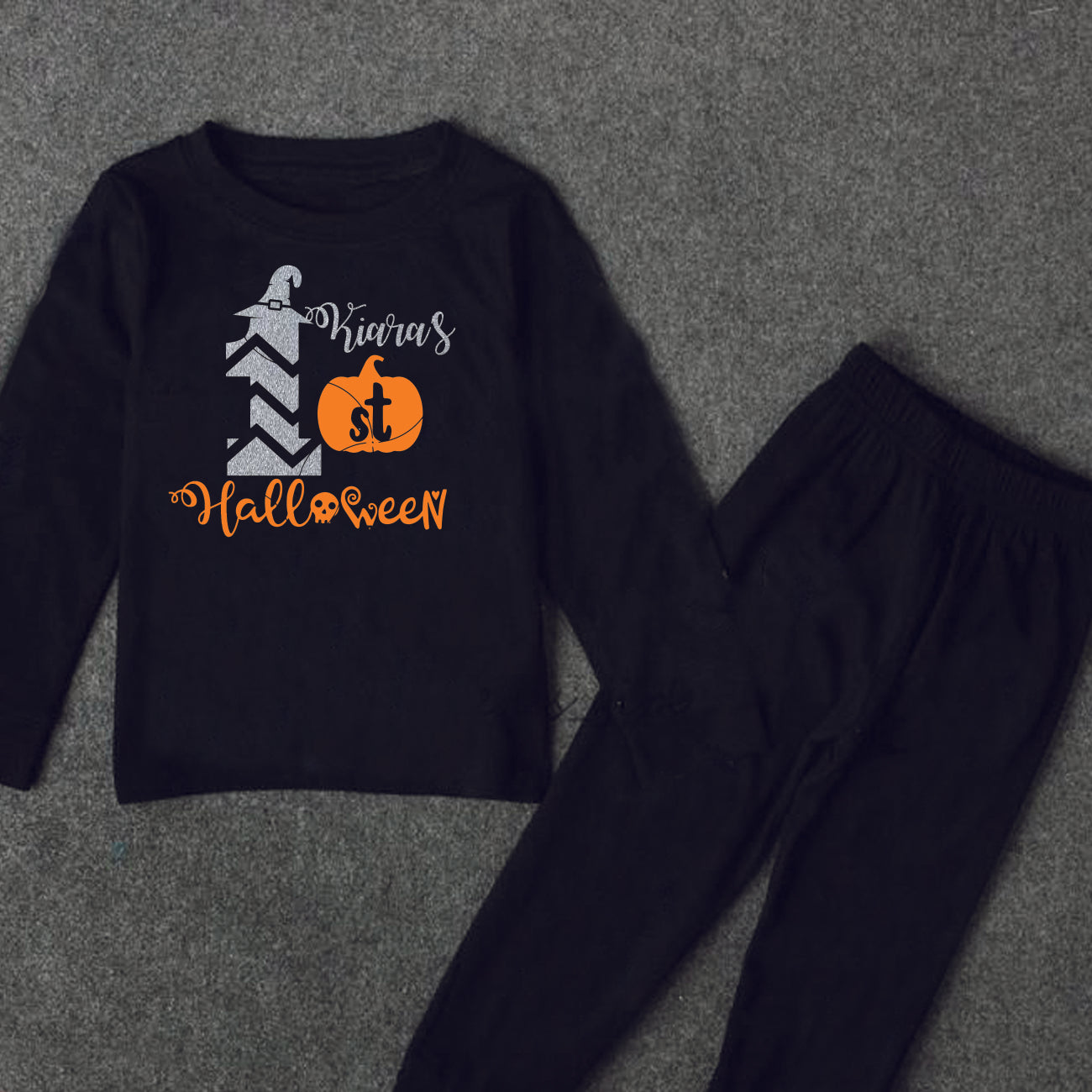 "Customizable 1st Halloween baby outfit with name."