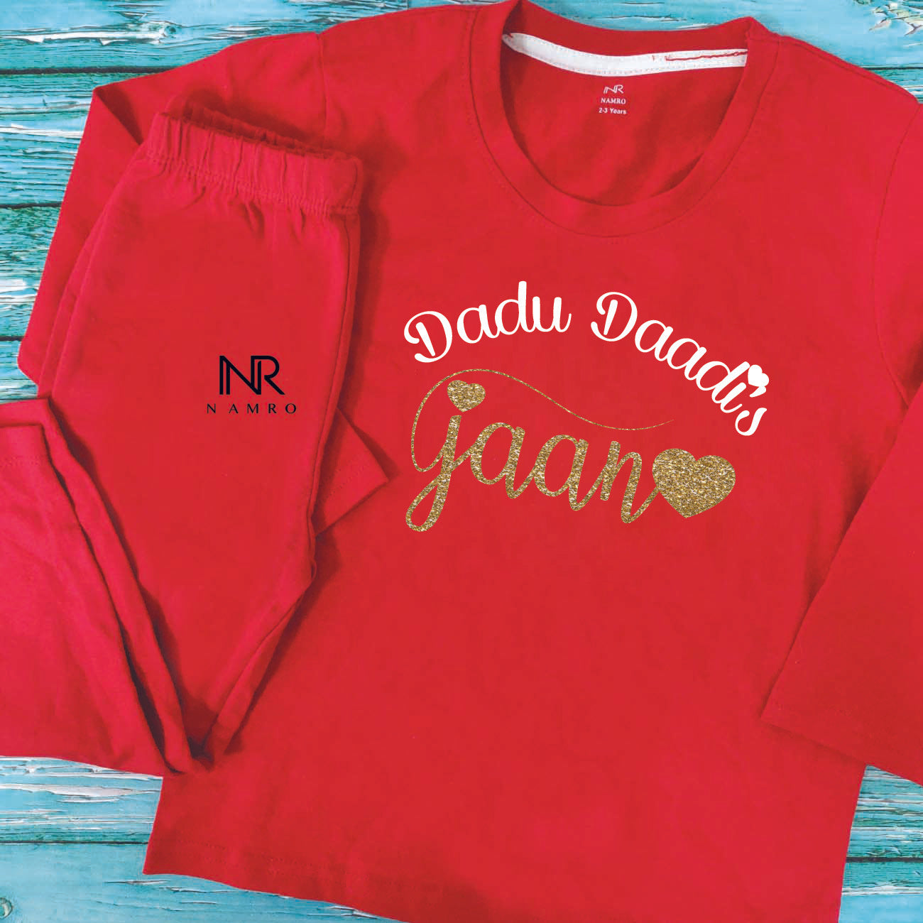 "Personalized baby T-Shirt & Pajama set with custom name and playful design."