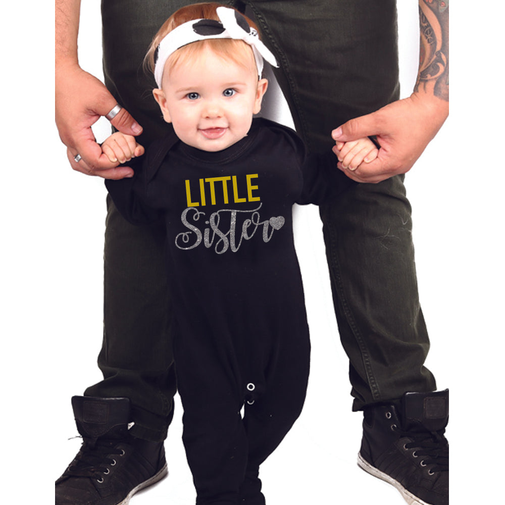 "Custom name Rakhi jumpsuit for your little one."