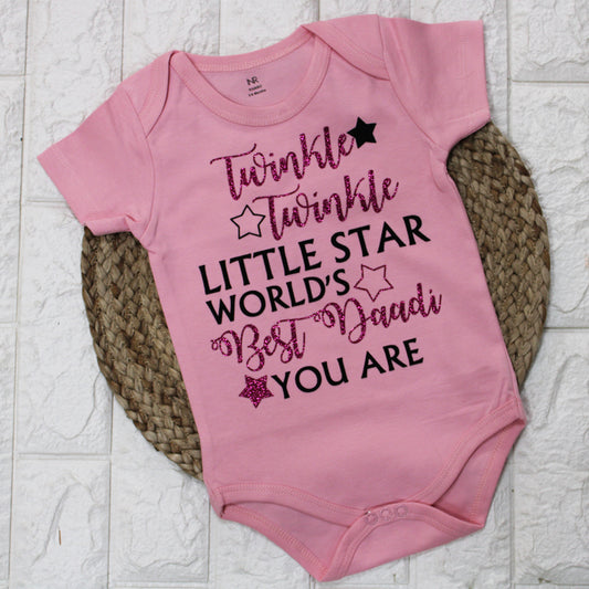 "Custom baby romper featuring a fun print and personalized text."