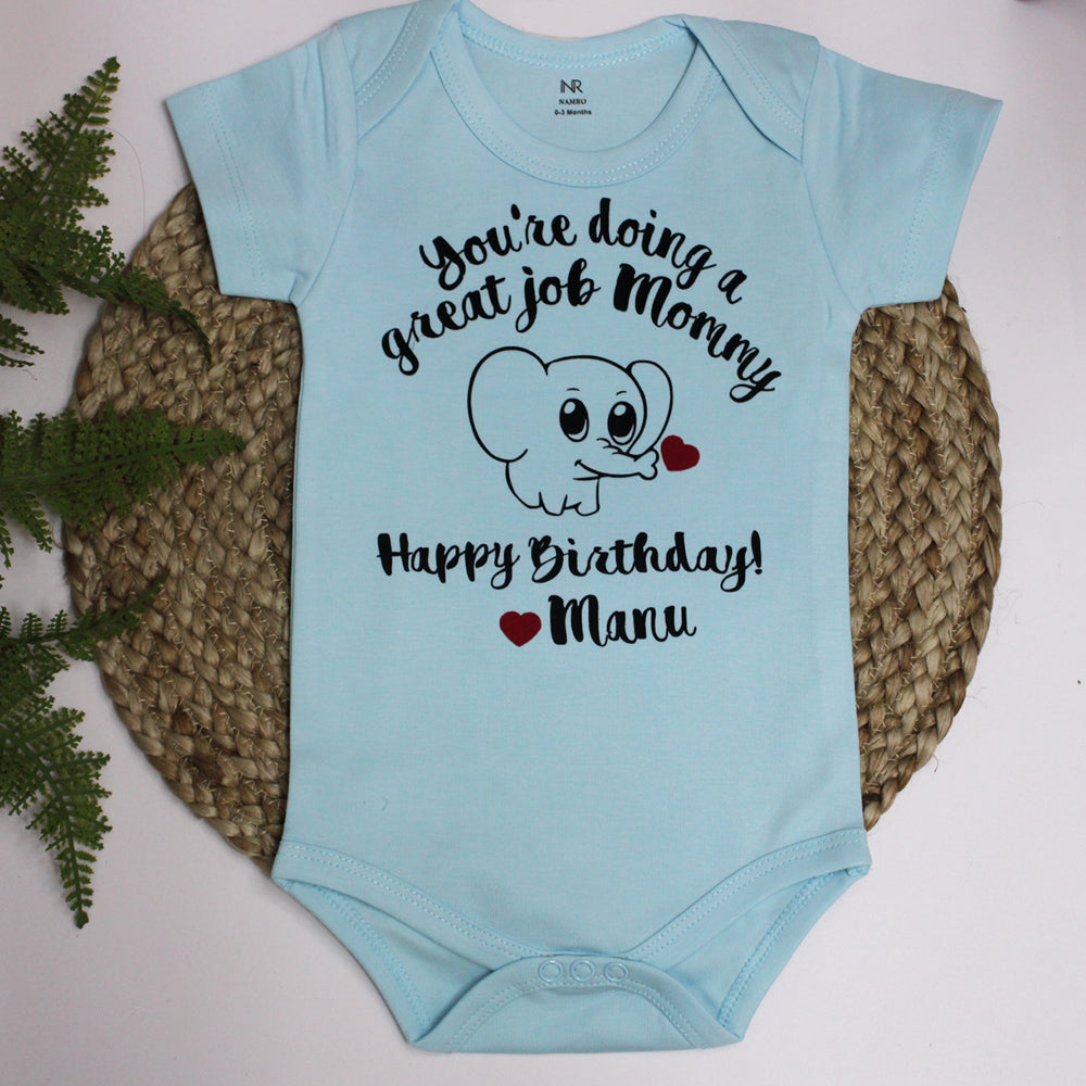 "Cute baby romper with a custom graphic and soft cotton fabric."