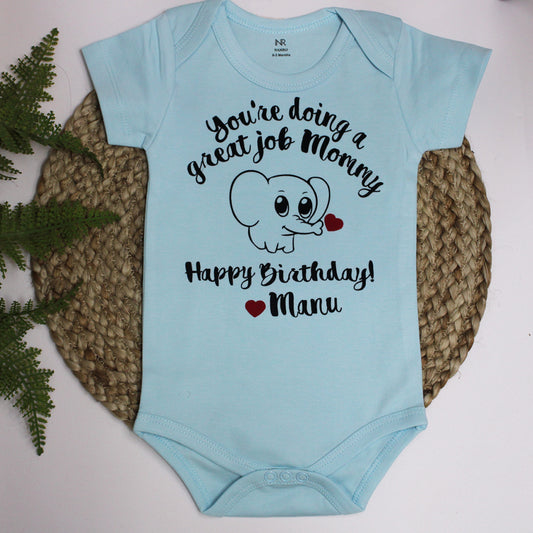 "Cute baby romper with a custom graphic and soft cotton fabric."