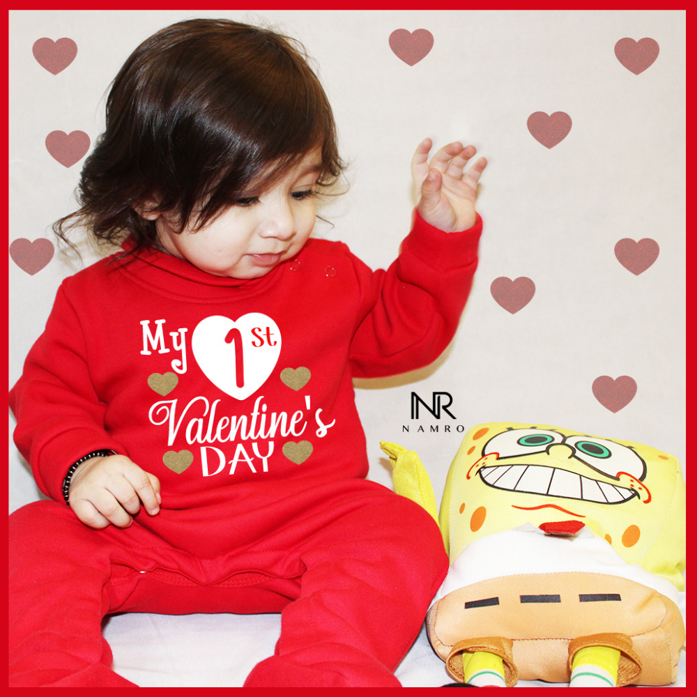 "Personalized baby Weellon jumpsuit with custom name and playful design."