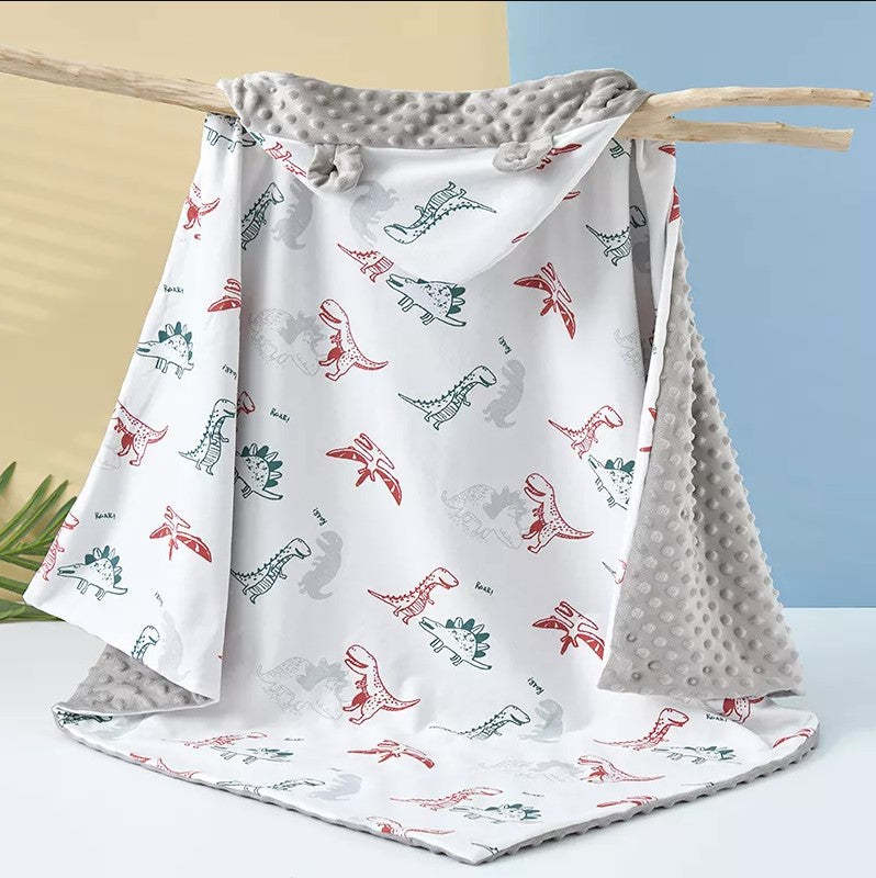 "Soft and comfortable baby Dino Minky Blanket with custom name."