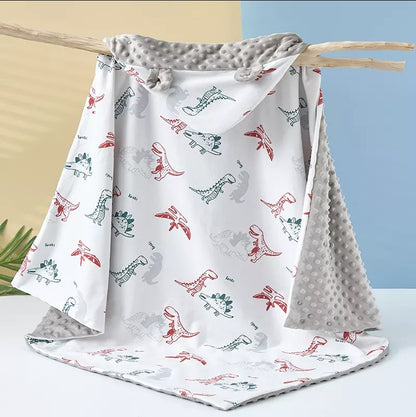 "Soft and comfortable baby Dino Minky Blanket with custom name."