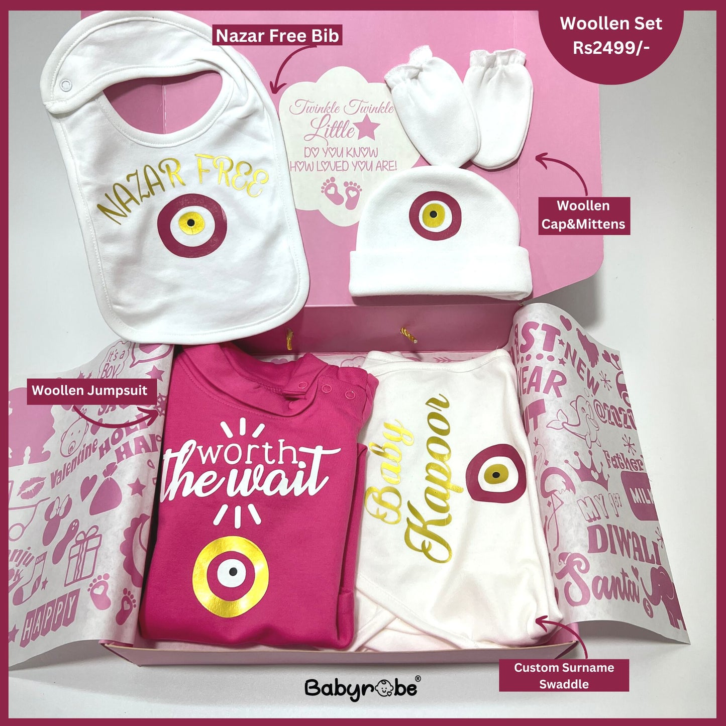 
Adorable custom jumpsuit for babies with unique artwork and cozy fit"

A charming baby girl gift set featuring a pink box filled with adorable accessories for newborns.
