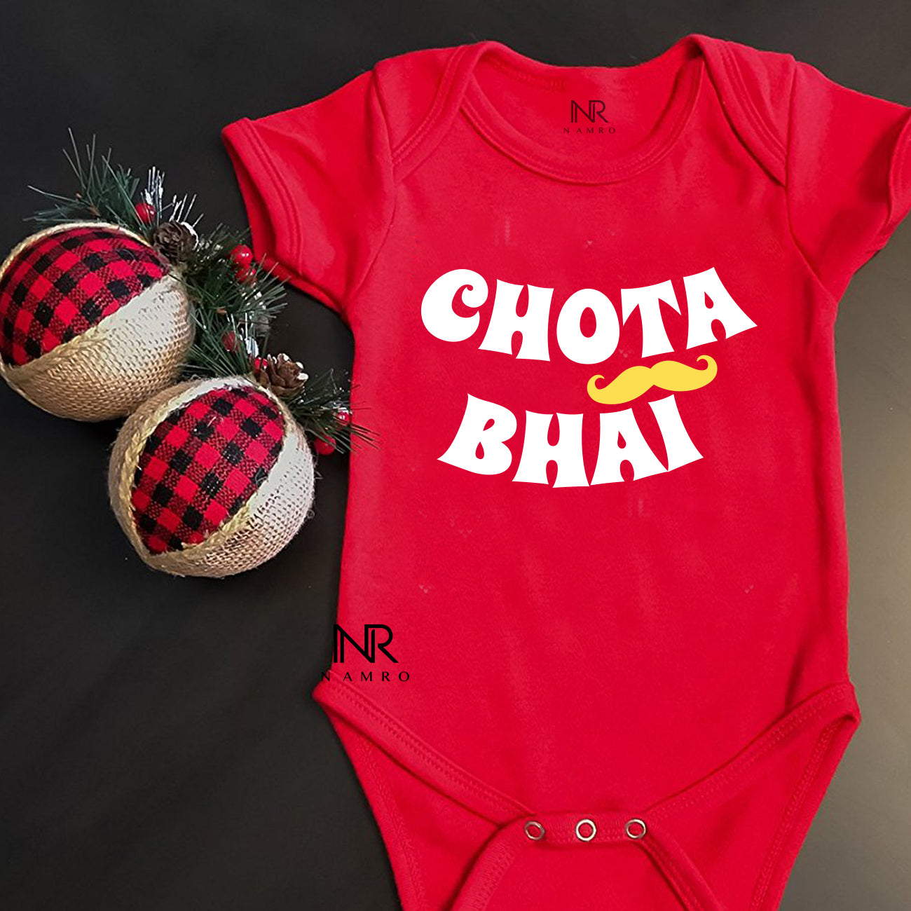 "Red onesies with personalized names, perfect for  special Rakhi."