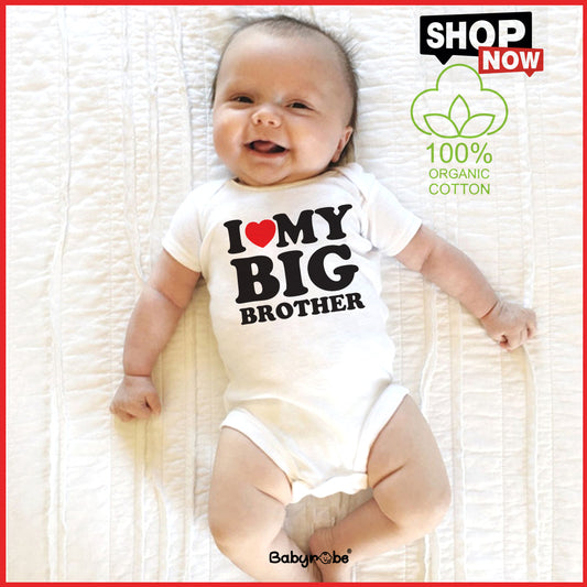"Personalized baby onesie for Rakhi with  name."
