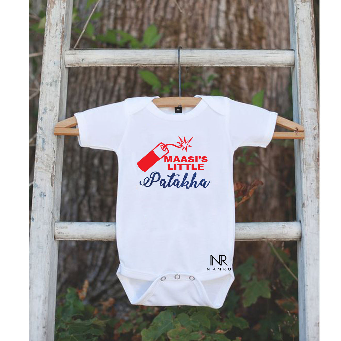 Maasi little patakha "Soft, cozy onesie customized with your baby’s name."
Personalized newborn onesie.


