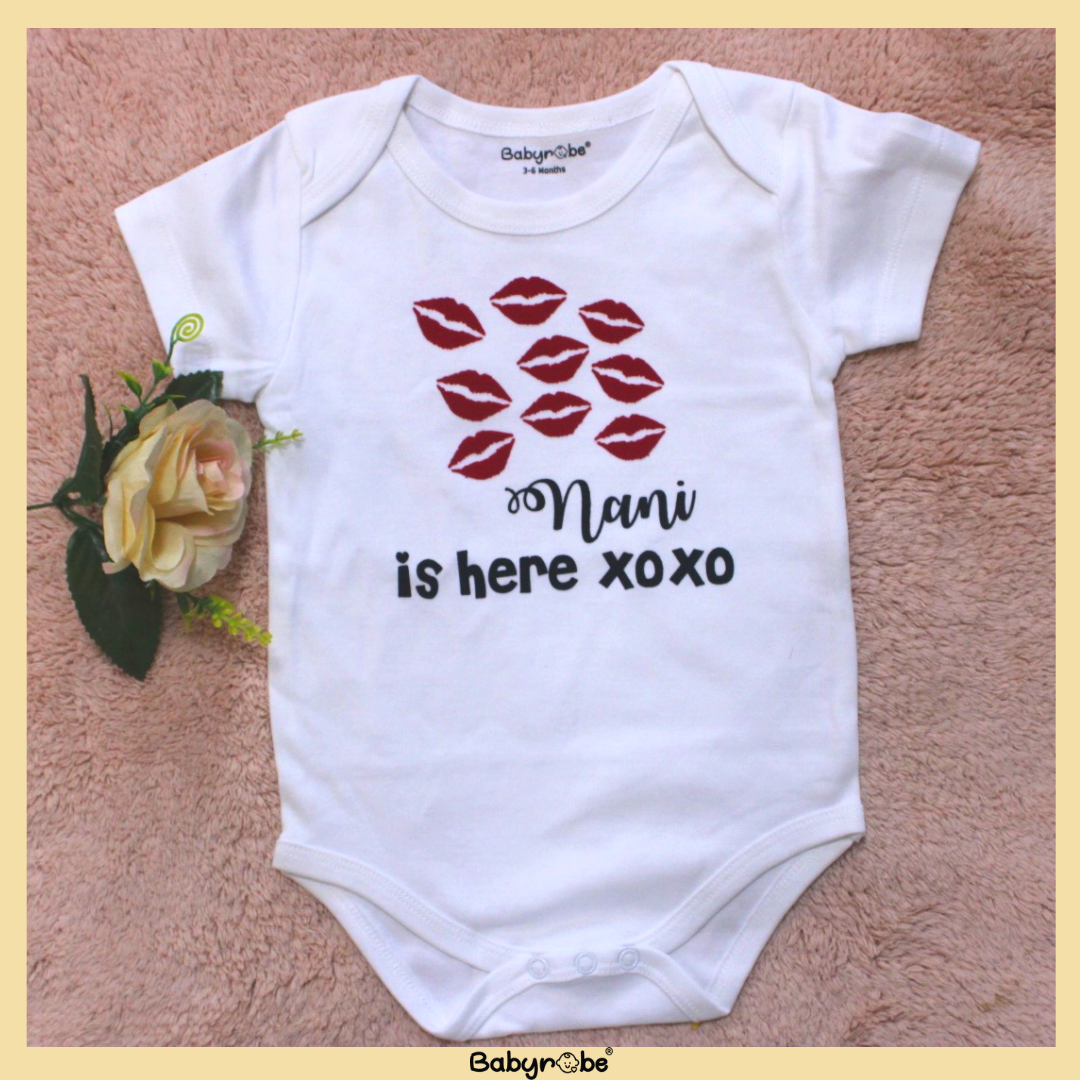 "Cute baby romper with a custom graphic and soft cotton fabric."
