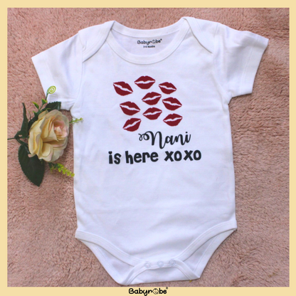"Cute baby romper with a custom graphic and soft cotton fabric."
