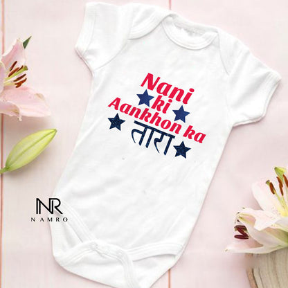 "Baby onesie with personalized name for a special Nani ki aankon ka Tara."